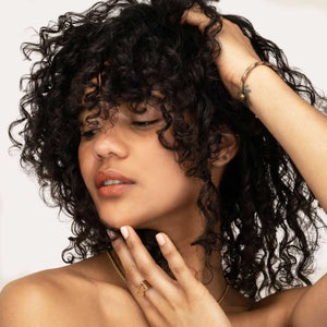 Curly hair model with defined hair