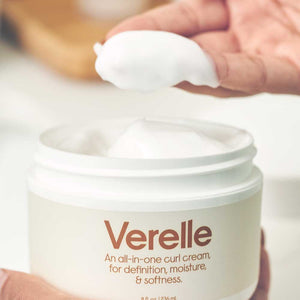 creamy white soft curl cream texture of verelle wavy all in one cream